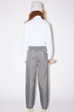 Sweatpants Mit Face-Aufnaher