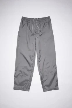 Sweatpants Mit Face-Aufnaher